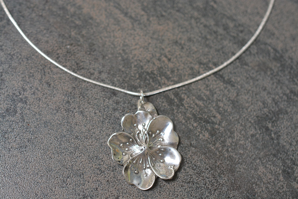 Golden or graphite necklace with tattooed cherry blossom from the Tattoo  collection TTN52-1 - ORSKA jewelry
